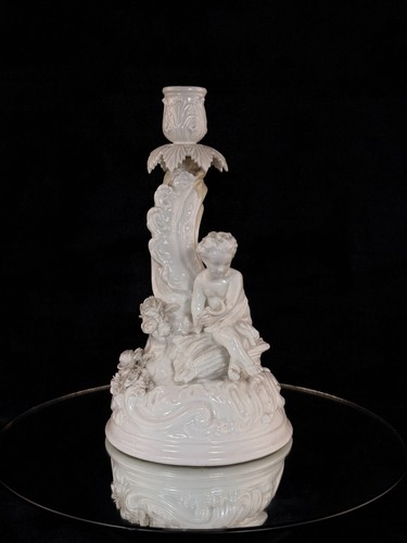 Antico candelabro cherubino