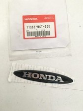 11365-MCT-300 ADESIVO EMBLEMA