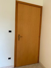 Porte in laminato finiture in noce Tanganica