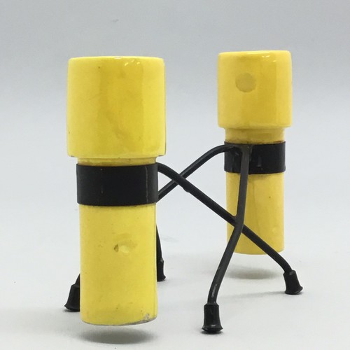 Yellow and black candlestick - and,