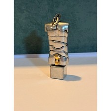 Mini scultura ciondolo puzzle