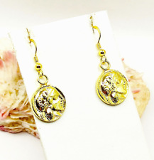 Orecchini pendenti fatti a