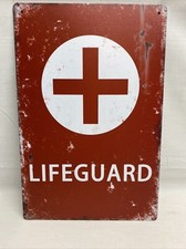 Insegna in metallo stile