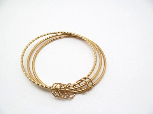 Set tre braccialetti tono - di,