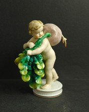 Antica statuina in porcellana