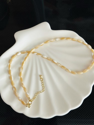 Collana perle conchiglia - di,