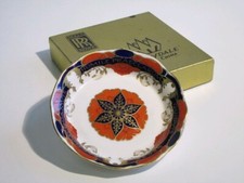 Piatto in porcellana Rolls