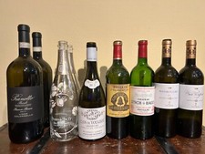 Lotto 16 bottiglie vuote di vini pregiati da collezione.