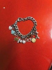 FOSSIL DESIGNER SILVERTONE CHARM BRACELET WITH 13 ADORABLE CHARMS