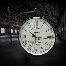 Orologio da parete doppio lato