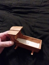 Culla bambola a dondolo