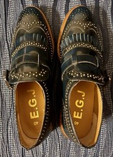 Scarpe in pelle verde scuro