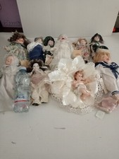 lotto collezione  11 bambole  ceramica