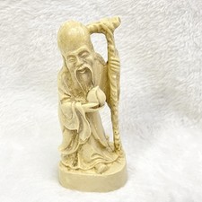 Statuina vintage in piedi