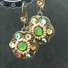 Orecchini grandi fiori firmati