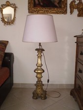 Antico candeliere in legno