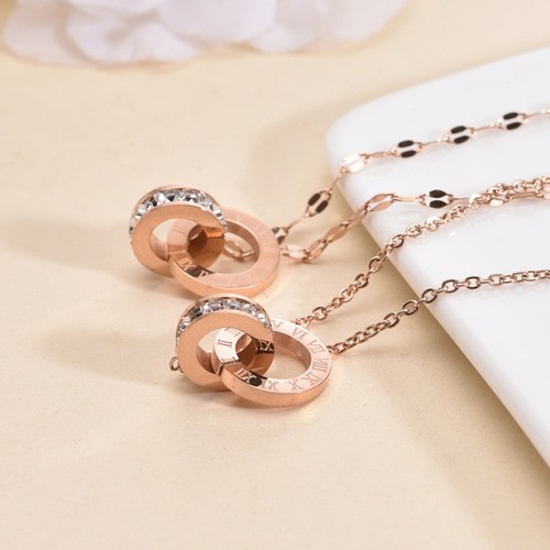 Collana con due anelli per