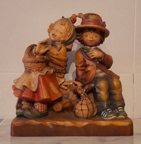 Statuina legno scolpito marca