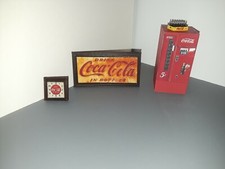 Insegna Coca Cola e Orologio