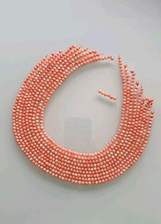 Fili di corallo rosa