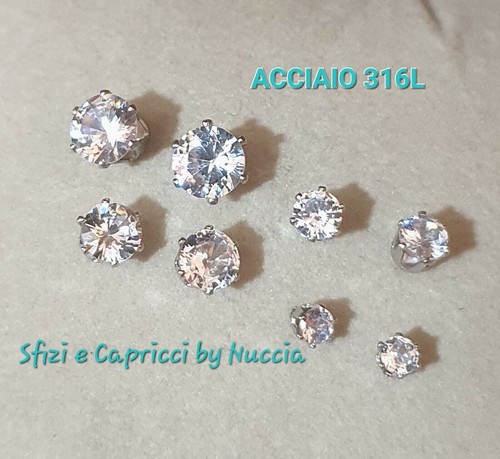 Orecchini coppia punto luce