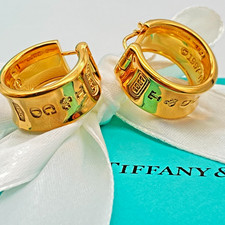 Orecchini a cerchio largo