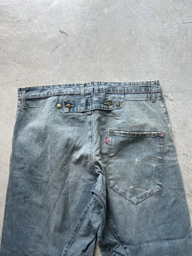 Fibbia jeans intrecciata