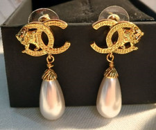 chanel earrings coco mark ,  lion series