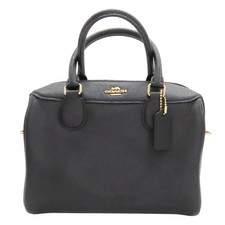 Borsa a tracolla Coach a mano