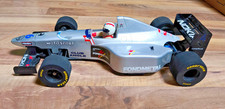 Auto radiocomandata vintage Tamiya F103 F1 con carrozzeria verniciata argento