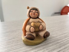 THUN raffigurante un bambino
