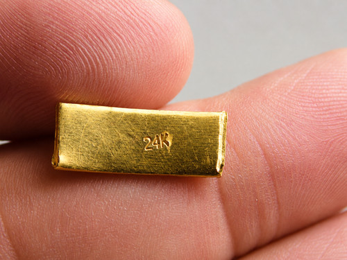 Pezzo triangolare oro - pezzo, in