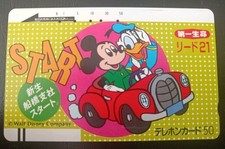 Scheda telefonica. Phone card. Telephone card. "Disney". Japan. 110-7687. Usata.