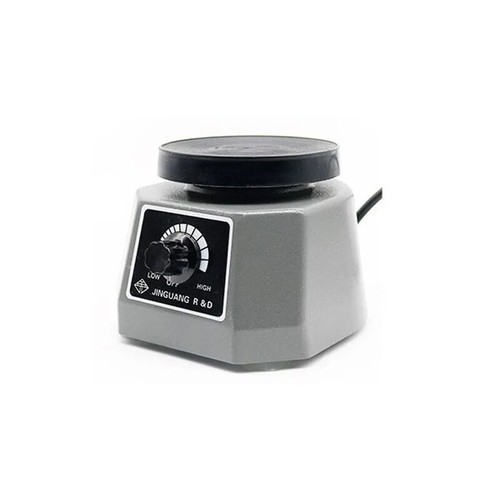 Vibratore per gesso dentale