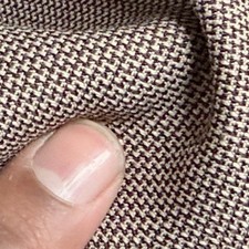 Abito a quadri con denti di