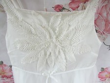 *Abito nuovo con etichette