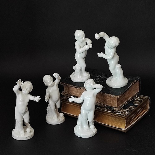Statuine puttini con bocce - -,