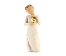 Statuetta ragazza con cuore