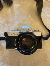 Fotocamera Minolta SRT 101B con obiettivo MD Rokkor 50 mm + Zoom