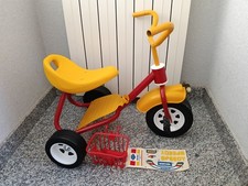Triciclo vintage rosso e