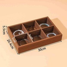 Vesti di gioielli in legno