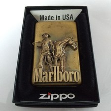 Accendino Zippo Marlboro cavallo cowboy metallo ottone dorato