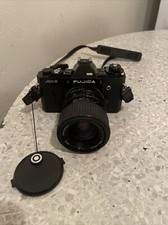 FOTOCAMERA FUJICA AX-3 35mm con obiettivo Tokina 35-70mm senza batteria