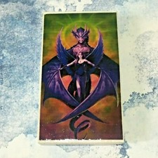 Calamita in legno con Angelo e