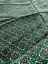Tessuto verde con motivo seta