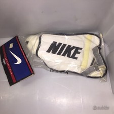 parastinchi NIKE nuovi bianchi con scritta nera TAGLIA L