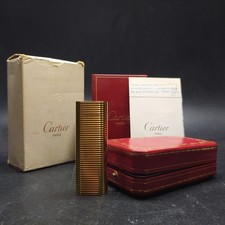 Accendino Cartier con incisione RS placcato oro, cofanetto con documenti