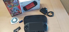 PSP E1004 negra con funda