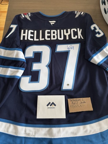 Signed connor hellebuyck - connor,