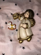 Angelo con Lanterna THUN originale in ceramica con cavallo a dondolo